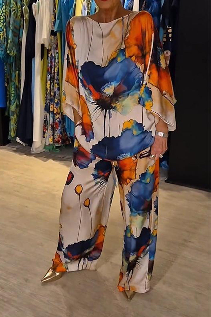 Elegantes zweiteiliges Ensemble mit Blumenmuster – Produktansicht 1
