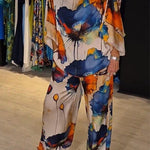 Elegantes zweiteiliges Ensemble mit Blumenmuster – Produktansicht 1
