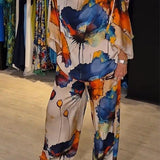 Elegantes zweiteiliges Ensemble mit Blumenmuster – Produktansicht 1