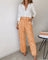 Elegantes Set aus Oberteil und Hose mit Bindegürtel – Produktansicht 6