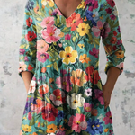 Lang geschnittene Bluse mit ausdrucksstarkem Print – Produktansicht 2