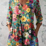 Lang geschnittene Bluse mit ausdrucksstarkem Print – Produktansicht 2