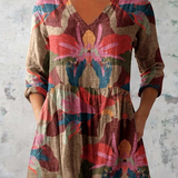 Lockere Bluse in langer Form mit Statement-Muster – Produktansicht 2