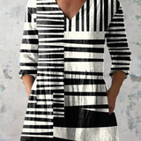 Lockere Bluse in langer Form mit Statement-Muster – Produktansicht 2