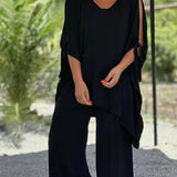 Elegantes Set aus Oberteil und Hose mit seitlichem Schlitz – Produktansicht 2