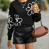 Weicher Pullover mit zarter Blumenstickerei – Produktansicht 11
