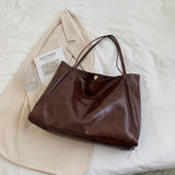 Glänzende Handtasche aus Leder – Produktansicht 5