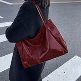 Glänzende Handtasche aus Leder – Produktansicht 9