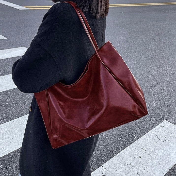 Glänzende Handtasche aus Leder – Produktansicht 9