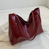 Glänzende Handtasche aus Leder – Produktansicht 4