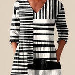 Lockere Bluse in langer Form mit Statement-Muster – Produktansicht 1