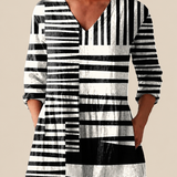 Lockere Bluse in langer Form mit Statement-Muster – Produktansicht 1