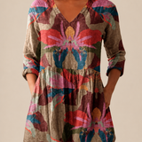 Lockere Bluse in langer Form mit Statement-Muster – Produktansicht 1