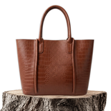 Elegante Schultertasche aus hochwertigem Material in Wickeloptik – Produktansicht 1
