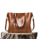 Elegante Handtasche aus Leder in Wickeloptik – Produktansicht 1