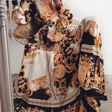 Bequemes Boho-Kleid mit buntem Druck mit Bindegürtel – Produktansicht 11