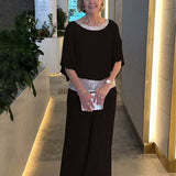 Elegantes Set aus Oberteil und Hose mit funkelnden Details – Produktansicht 3